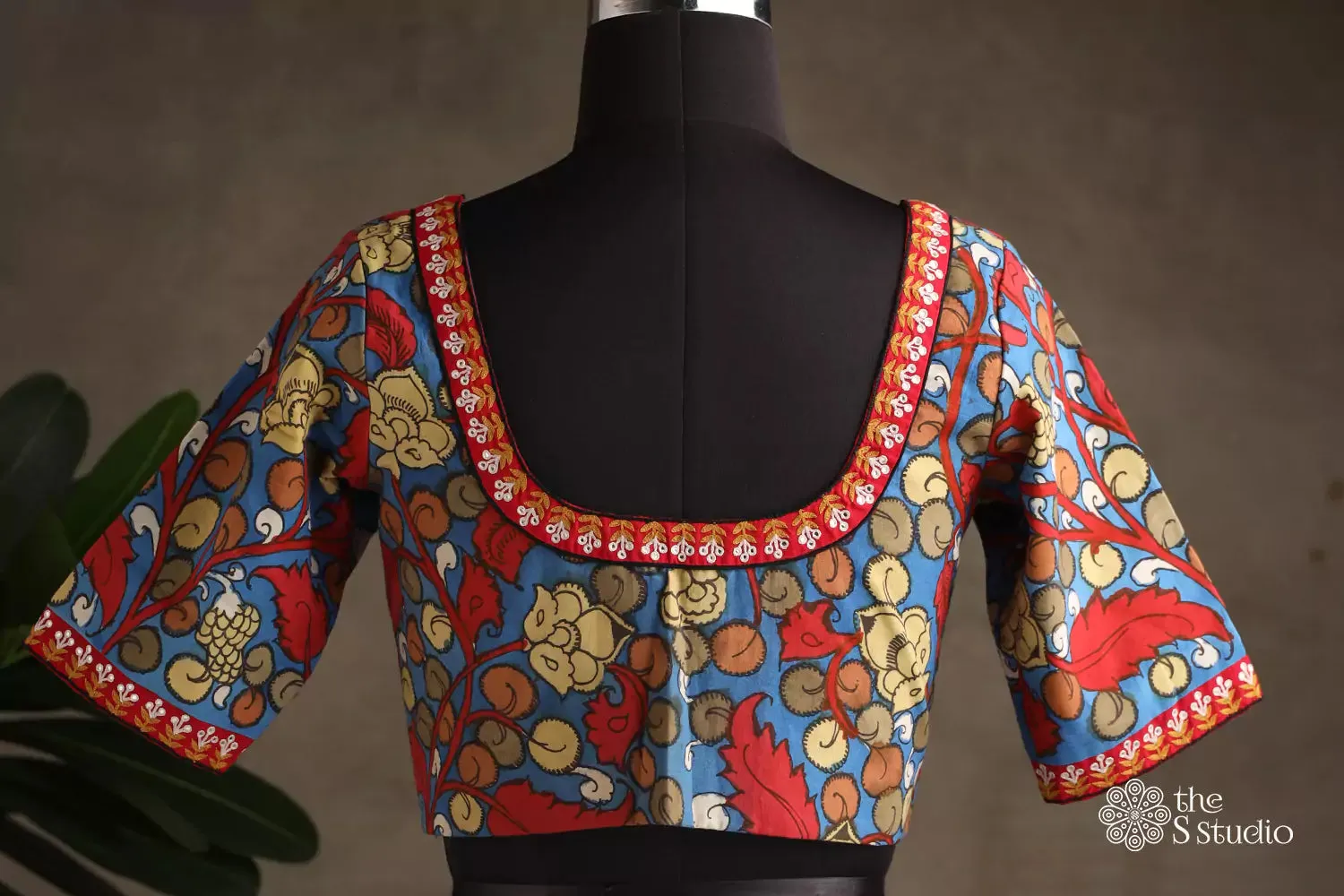 Blue handpainted kalamkari blouse with neck embroidery